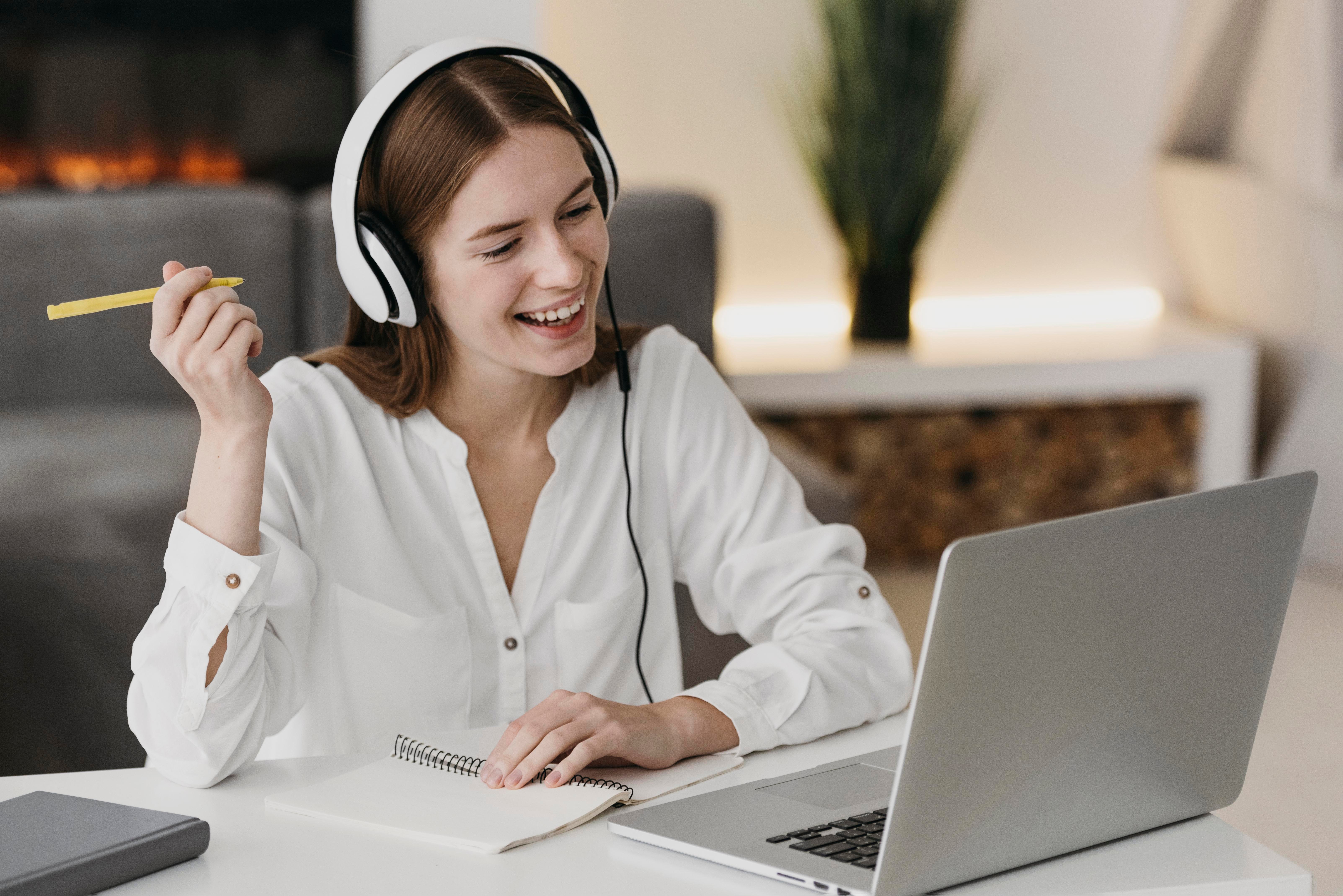 happy-teacher-talking-with-her-students-online